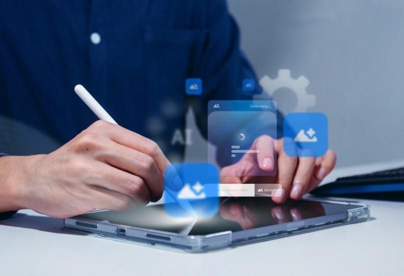 A person using a tablet with holographic AI interface elements